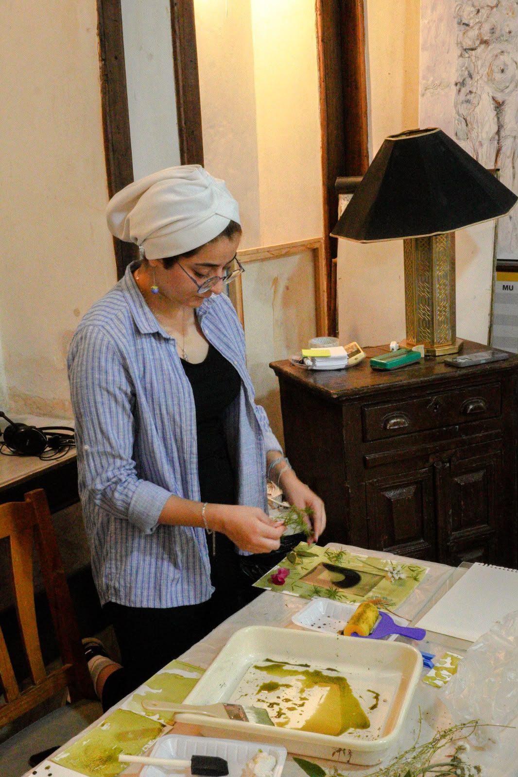 Cyanotype workshop participant preparing plants and negatives, Damascus, September 2026