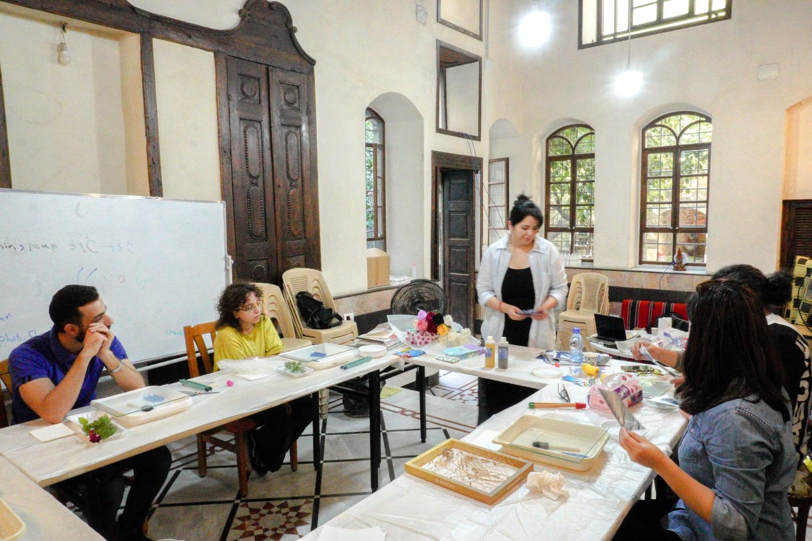 Black and white film developing session with tanks and chemistry, Damascus, September 2026